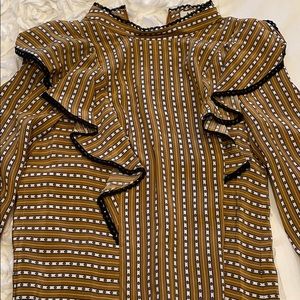 a brand new light brown flowy blouse top